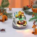 Festive LED illuminated Christmas resin music box featuring a rotating toy train ornament - Double Rotating Christmas Tree Style