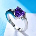 Elegant silver-toned heart ring with a large purple zircon and micro-pave accents - US 7 / Silver Purple Zirconia