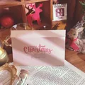Elegant vintage pink Christmas greeting card with Santa Claus Post Office stamp and envelope - Santa with Hat - Pink Style