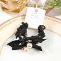 Eleganter schwarzer Haargummi mit Schleife und Perlen, 2er-Set Karte - 2er Pack / Schwarz