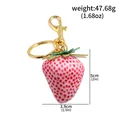 Realistic pink strawberry keychain pendant showing height and weight parameters - Pink Dotted Strawberry Pendant (k00978-05)