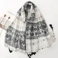 Lightweight Bali yarn scarf featuring ethnic geometric black patterns and tassel edges - Ethnic Geometric Totem (SL2606-025)