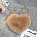Plush heart-shaped crossbody bag featuring gold chain strap in warm camel brown color - Khaki