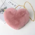 Soft pink faux fur plush heart-shaped crossbody bag with elegant gold chain strap - Dusty Pink