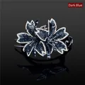 Elegant dark blue rhinestone flower hair clip with sparkling crystals on black. - Dark Blue
