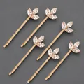 Set of six elegant gold-tone bobby pins decorated with marquise crystal leaves - 6-Piece Gold Clover Style (HS-J7430G) / Gold
