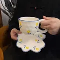 Ceramic floral coffee cup and saucer set with cream glaze and blue hand-painted edge - Yellow Flower Cloud-shaped Cup (300ml) + Saucer (17cm)