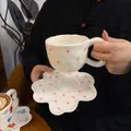 Irregular cream ceramic coffee cup and saucer set with delicate pink floral patterns - Starry Flower Cloud Cup 300ml + Saucer 17cm