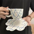 Handmade ceramic coffee cup and petal tray set with blue lattice and bow patterns - Embossed Blue Mesh Cloud Cup 300ml + Saucer 17cm