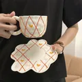 Handmade ceramic coffee cup and saucer set with cute bow and heart grid pattern - Embossed Orange Mesh Cloud Cup 300ml + Saucer 17cm