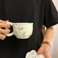 Creamy ceramic coffee cup and saucer set with floral patterns and wavy texture - Powder Blue Floral Cloud Single Cup 300ml