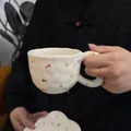 Handmade wavy ceramic coffee cup and saucer with colorful floral patterns in creamy white - Miniature Tulip Cloud (300ml Per Cup)