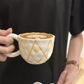 White ceramic coffee cup with yellow diamond grid pattern and heart detail - Embossed Yellow Mesh Cloud Single Cup 300ml