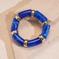 Elegant blue marbled acrylic elastic bracelet with gold spacers on stone background - 50# Bracelet (HB3859) / Blue Ink-wash Round