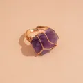 Unique wire wrapped natural amethyst raw stone ring with an adjustable golden band - Purple Crystal / Gold
