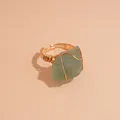 Unique handmade wire wrapped ring with a raw green natural crystal stone in gold finish - Light Green Stone / Gold
