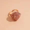 Elegant handmade wire-wrapped natural raw strawberry crystal stone ring with gold band - Light Red Stone / Gold