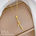 Gedetailleerd overzicht van de titanium stalen knoopketting met strass en maten - Knoopknoop Stijl (G104) / Goud