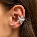 Silver-colored starfish ear cuff with sparkling stones for non-pierced ears variant. - Rhinestone Starfish Ear Cuff (2320) / Silver