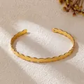 Elegant golden scalloped open bangle bracelet with a minimalist wavy design for daily wear - Oval Hollow Splicing Style / Gold