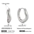 Minimalist silver wavy stainless steel hoop earrings with size measurements - Silver Wave Pattern Earrings (JDE0306060-S)