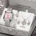 Detailed view of a silver-tone women's quartz watch with a pink dial and matching jewelry set. - Rectangular Watch Heart Jewelry Set / Silver Pink Dial
