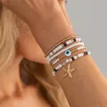 Set di braccialetti con perline colorate stile oceano con stella marina e malocchio - Set di Perline Evil Eye e Stella Marina (07162)