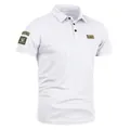 Close-up view of a white short-sleeved Polo shirt featuring military U.S. Army patches - M / White