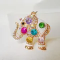 Cute alloy elephant keychain with colorful rhinestones and white enamel finish. - Colorful