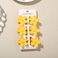 Set of six vibrant matte yellow plumeria flower hair claw clips on white display card - Five-Petal Flower / 6-Piece Set (With Card) / Matte Bright Yellow