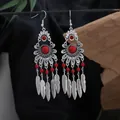 Bohemian ethnic style silver-plated earrings with red stones and feather tassels detail. - Red Silver (E4708)