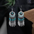 Bohemian ethnic style tassel earrings featuring turquoise beads and silver feather charms - Blue Silver (E3047-2)