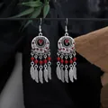 Vintage bohemian silver dangle earrings with vibrant red beads and delicate feather tassels - Red Silver (E2877-18)
