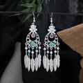 Elegant Bohemian silver feather tassel earrings with turquoise and pink floral accents. - Multicolor Silver (E6233-3)