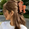 Stylish orange acrylic tiger hair claw clip for women's half-up hairstyles - Tiger
