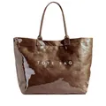 Detailed macro view of a large brown glossy tote bag with a white TOTE BAG text print - Brown