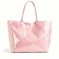 Detailed view of a pink metallic finish tote bag with white TOTE BAG text on front side - Pink