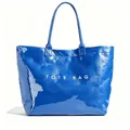 Detail view of a minimalist blue tote bag with a high-gloss crinkled texture - Blue