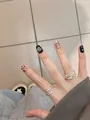 Detailed close-up of stylish press-on nails with cute heart and cartoon dog designs - All Sizes Set / Unforgettable Style (BY1474)