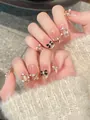 Elegant cat-eye press-on nails featuring black gold French tips and 3D bow charms - M / Golden Dreams Style (BY1923)