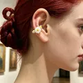 Vintage daisy flower ear cuff with colorful beads shown on female model - Colorful Daisy Ear Clip (2605152) / Single Piece