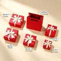 Red jewelry gift box set featuring various sizes and white bow ribbons for holiday. - Noble Red (Gold Edge)