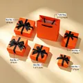Orange gift boxes with black ribbon bows in multiple sizes and matching tote bag - 5X5X3cm / Vibrant Orange (Gold Edge)