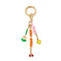 Pendentif de sac coloré avec des breloques florales et des finitions dorées. - Pendentif Cerise Perlé Orange