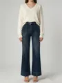 Detail of women's high waisted wide leg jeans with washed blue finish and front pockets - S / Blue