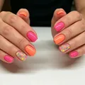 Set of 24 short square press-on nails with vibrant pink and orange floral designs - Yellow Jelly Glue + Nail File