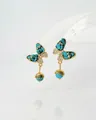 Detailed view of turquoise butterfly earrings with zircon accents and gold hardware - Butterfly Turquoise Style (WXE4955Y)