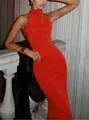 Close-up of red high-neck sleeveless mermaid dress showing slim fit silhouette and fabric - Orange Red