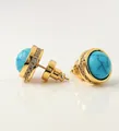 Macro detail of round blue turquoise earrings with zircon pavé set in golden finish - Round Turquoise Style (WXE4222Y)