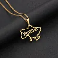 Detailed close-up of gold-plated Ukraine map pendant with Cyrillic engraving on black leather - Ukraine Lettering Map (金色项链D) / Gold